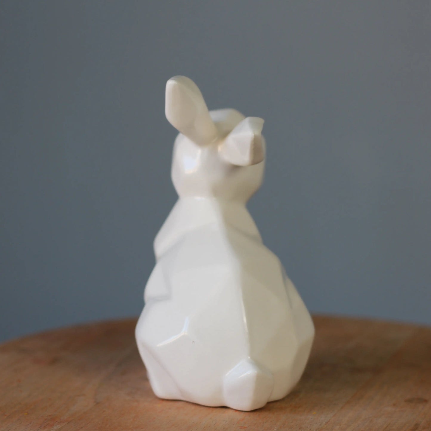 ceramic white bunny turned backwards