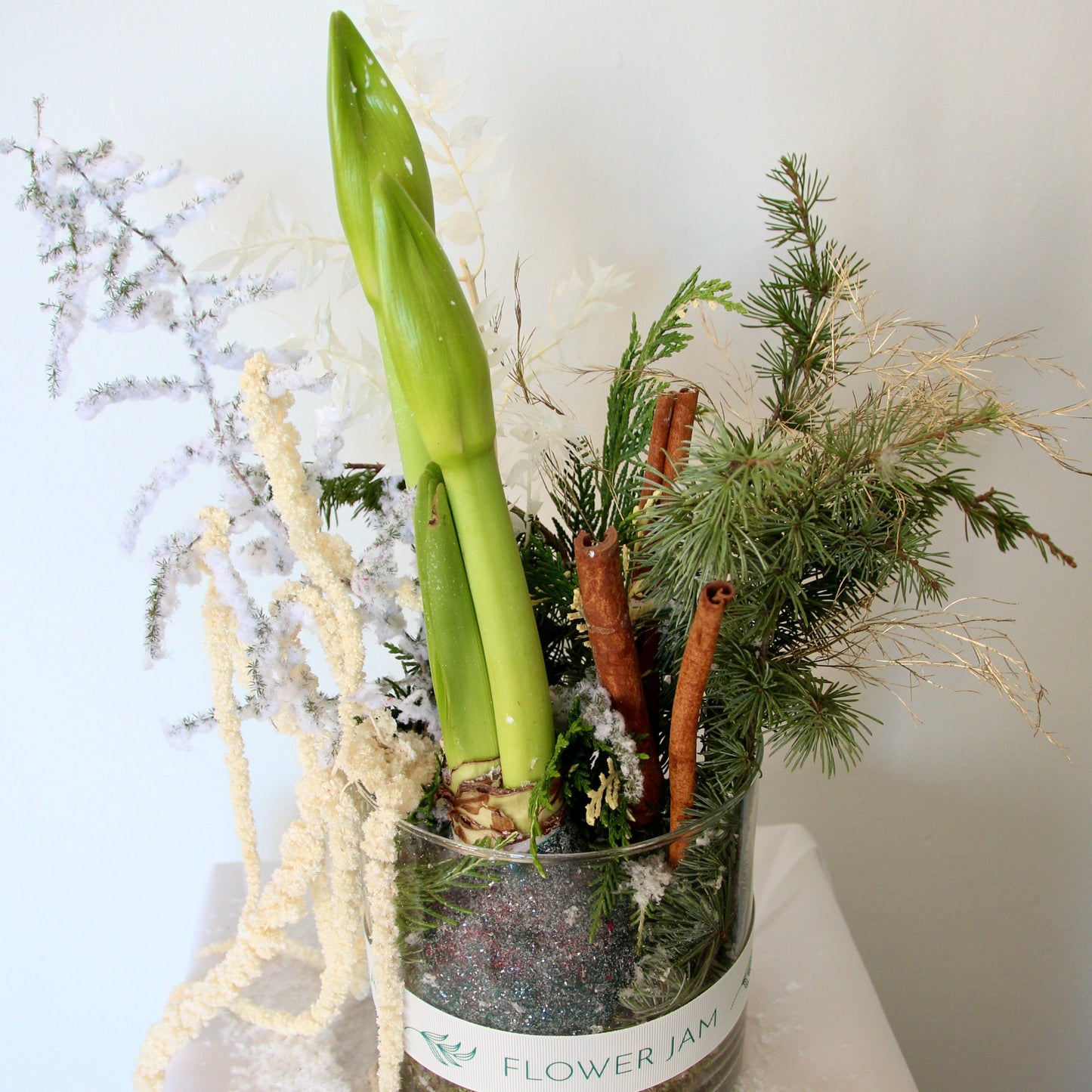 clear vase Christmas arrangement 
