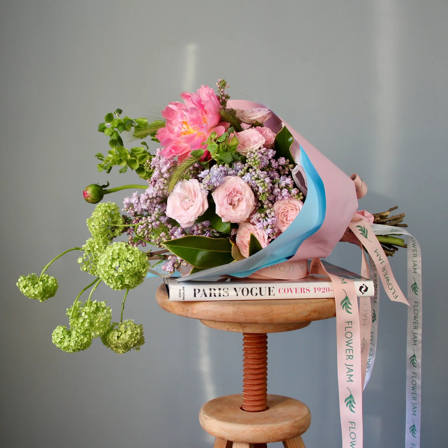 bouquet of pink flowers and greenery
