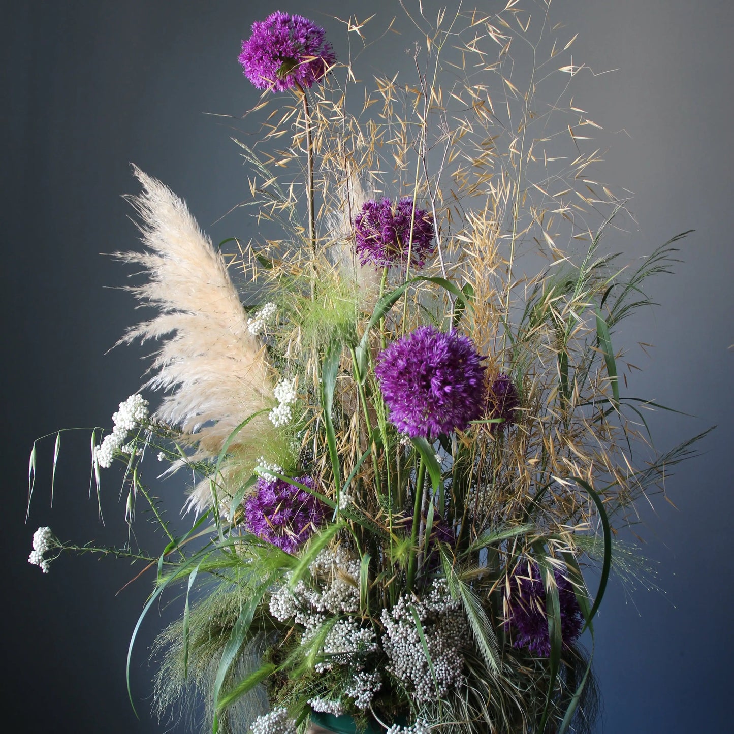 flower composition out of alium and greenery