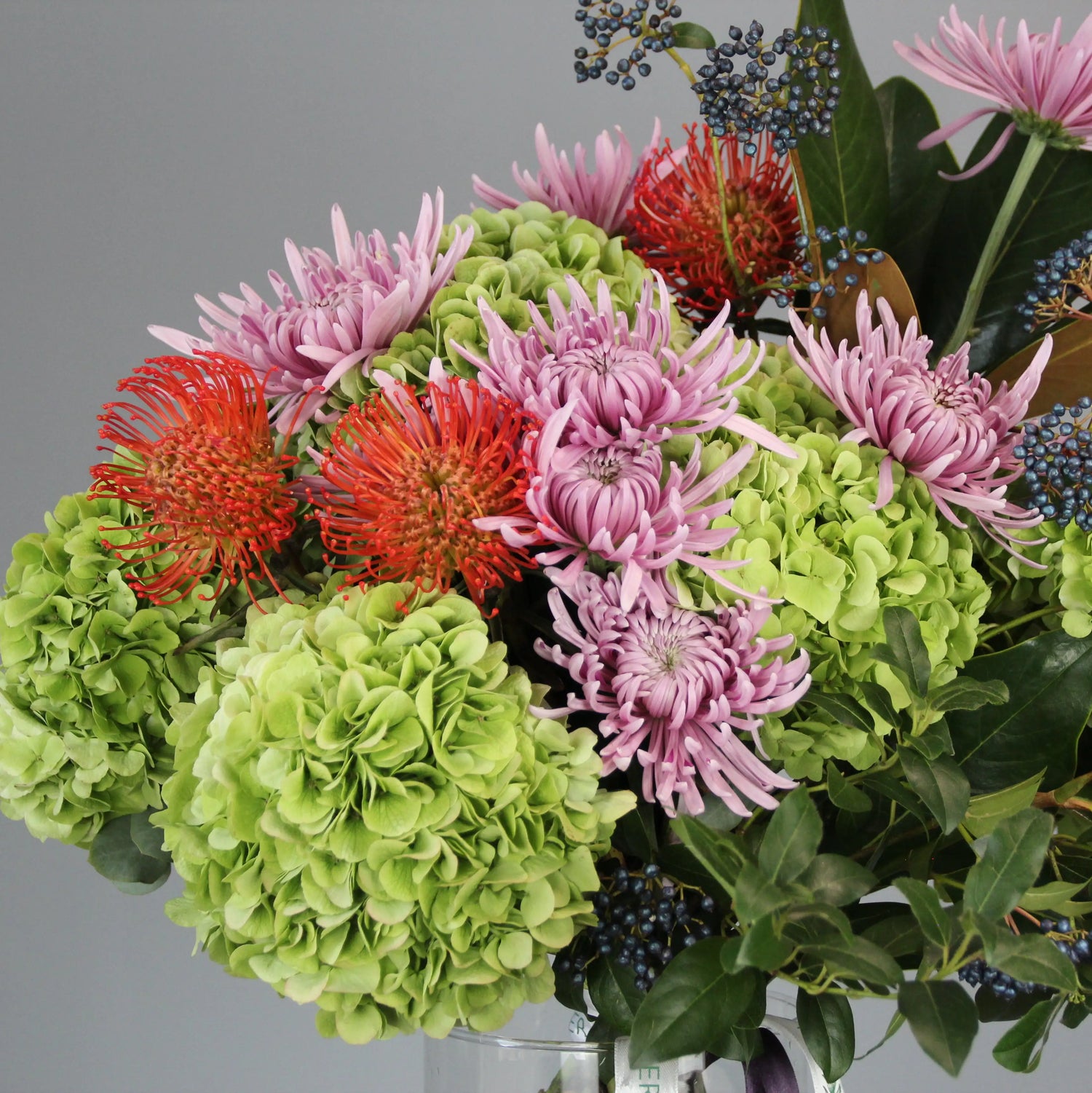 green hortencia bouquet and colorful flowers