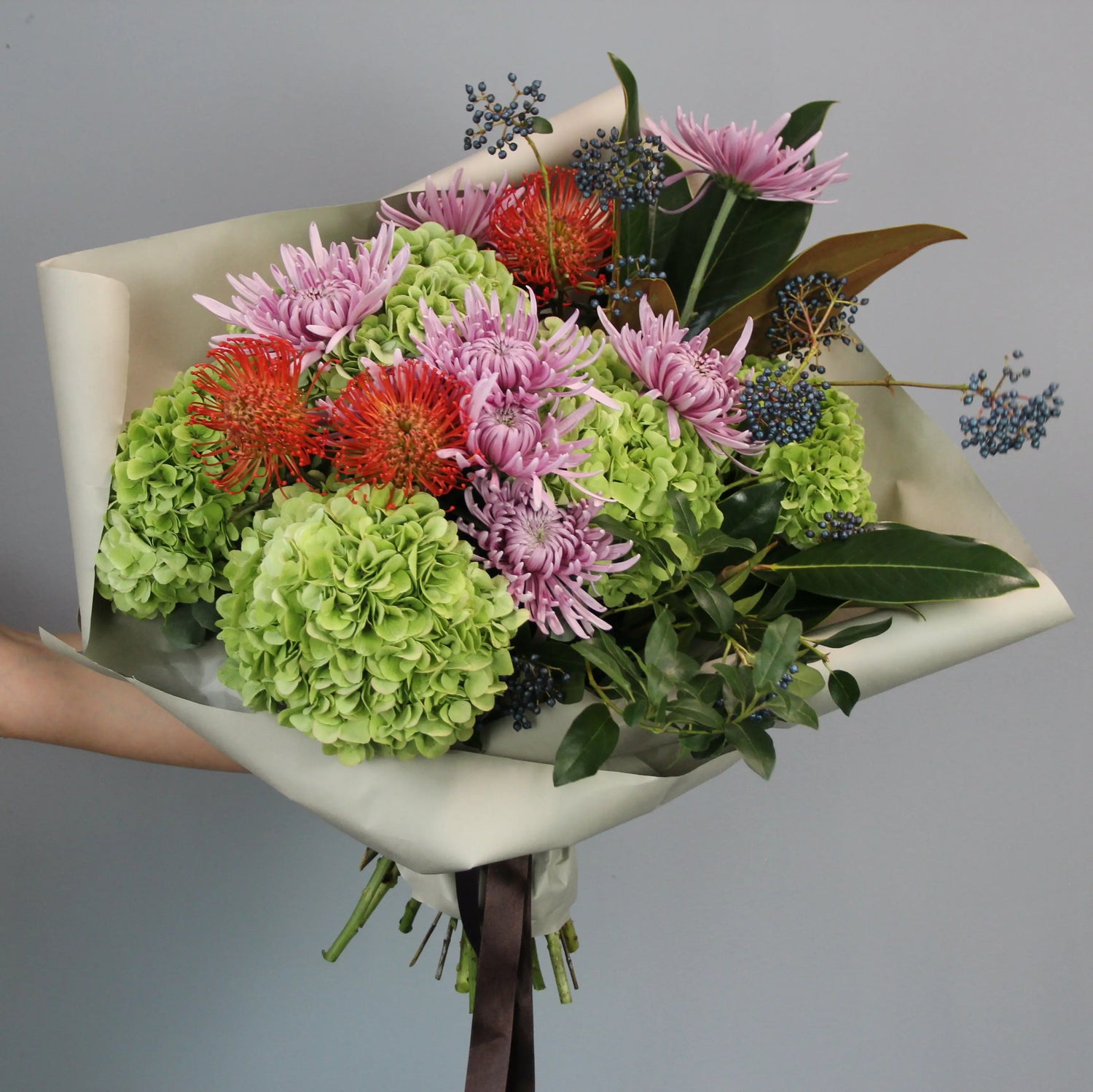 green hortencia bouquet and colorful flowers