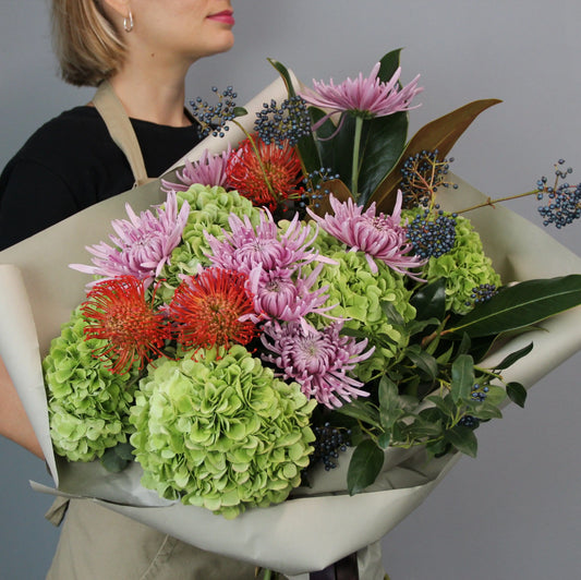 green hortencia bouquet and colorful flowers