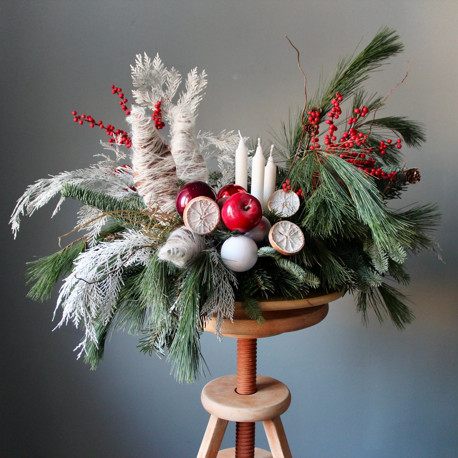 red berries branches of blue spruce Christmas Composition