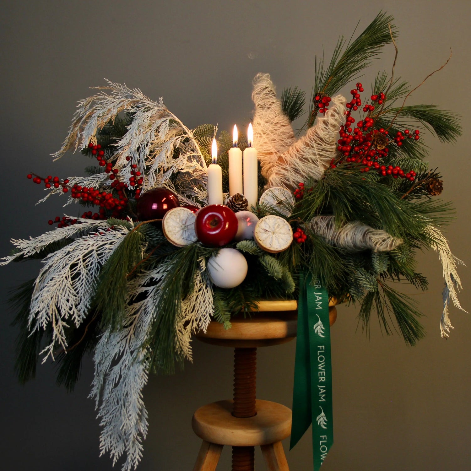red berries branches of blue spruce Christmas Composition