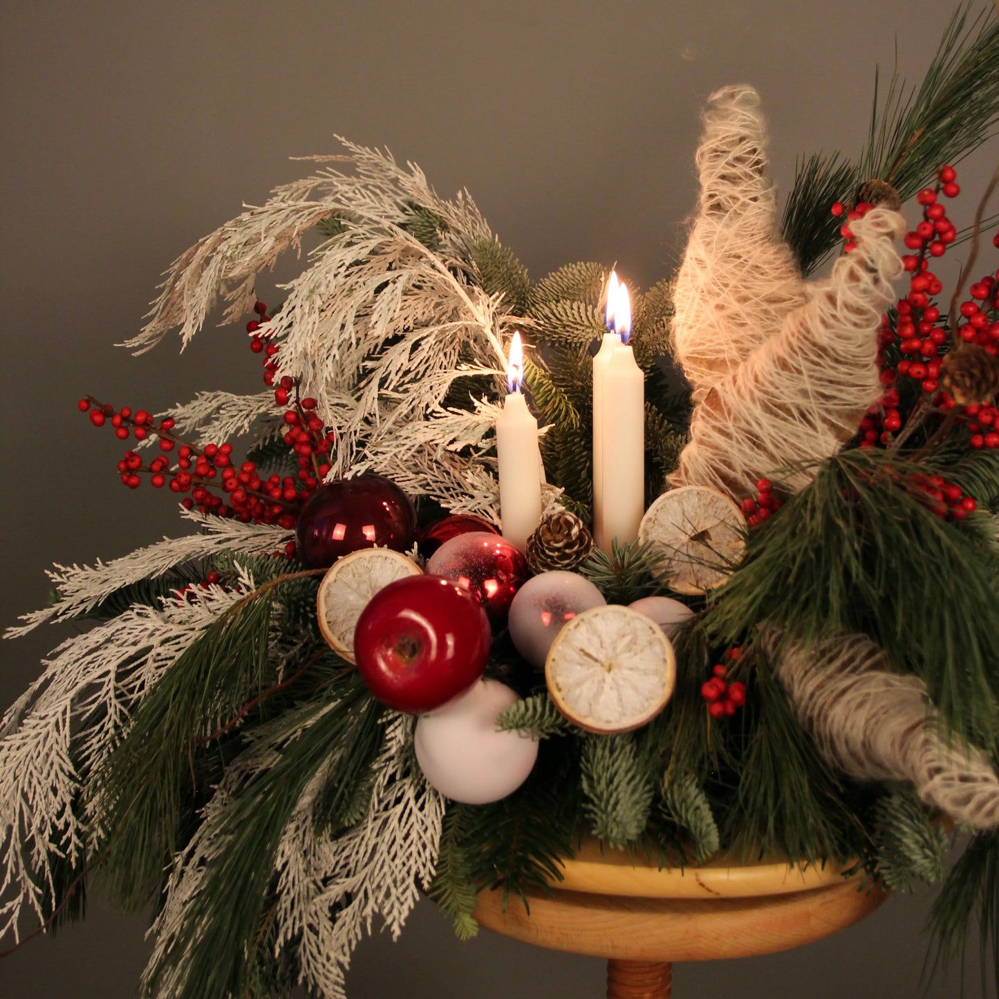 red berries branches of blue spruce Christmas Composition