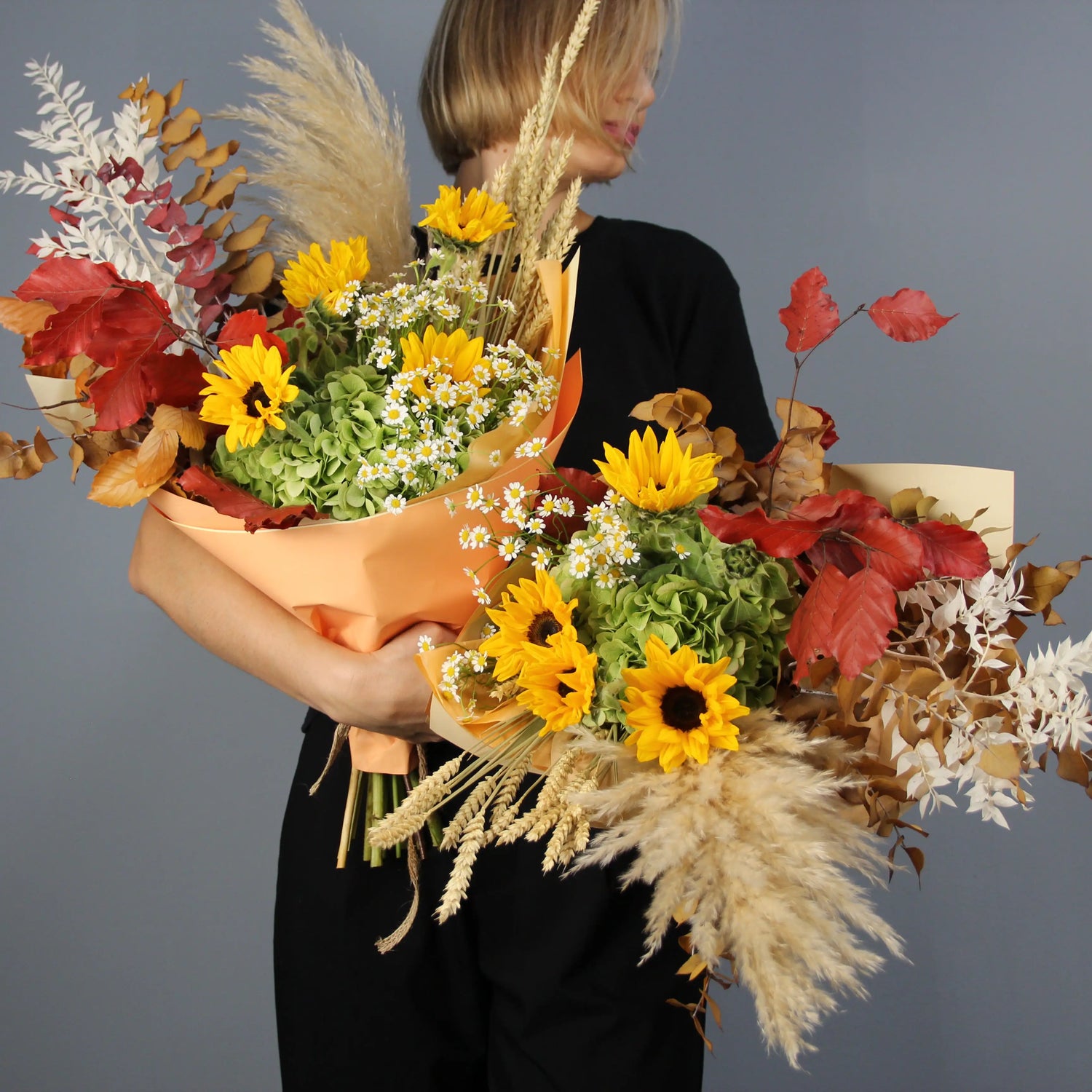 colorful summer bouquet wih brown, yellow, red and white flowers