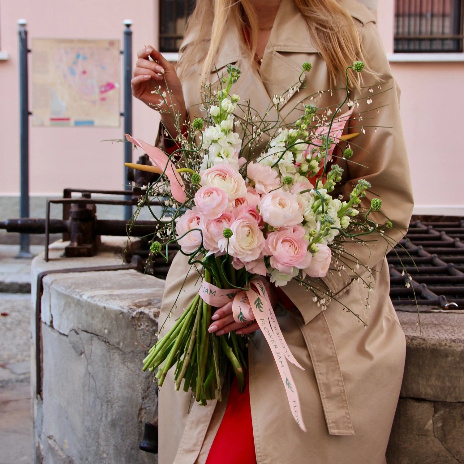 Bouquet of beautiful Ranunculus, Matthiola , Allium , Anthurium and blossom branches.