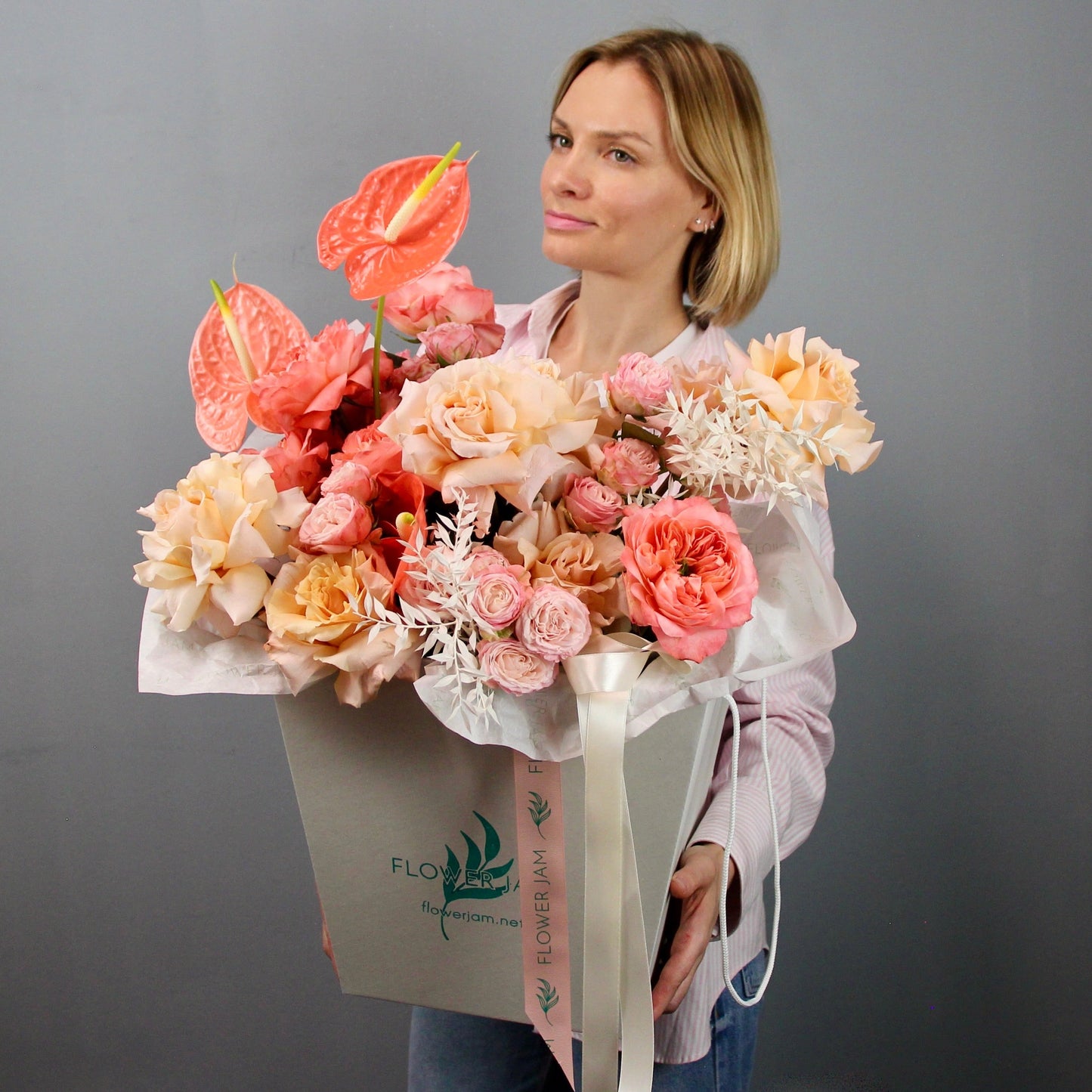 pink roses mix with anthurium at flower store