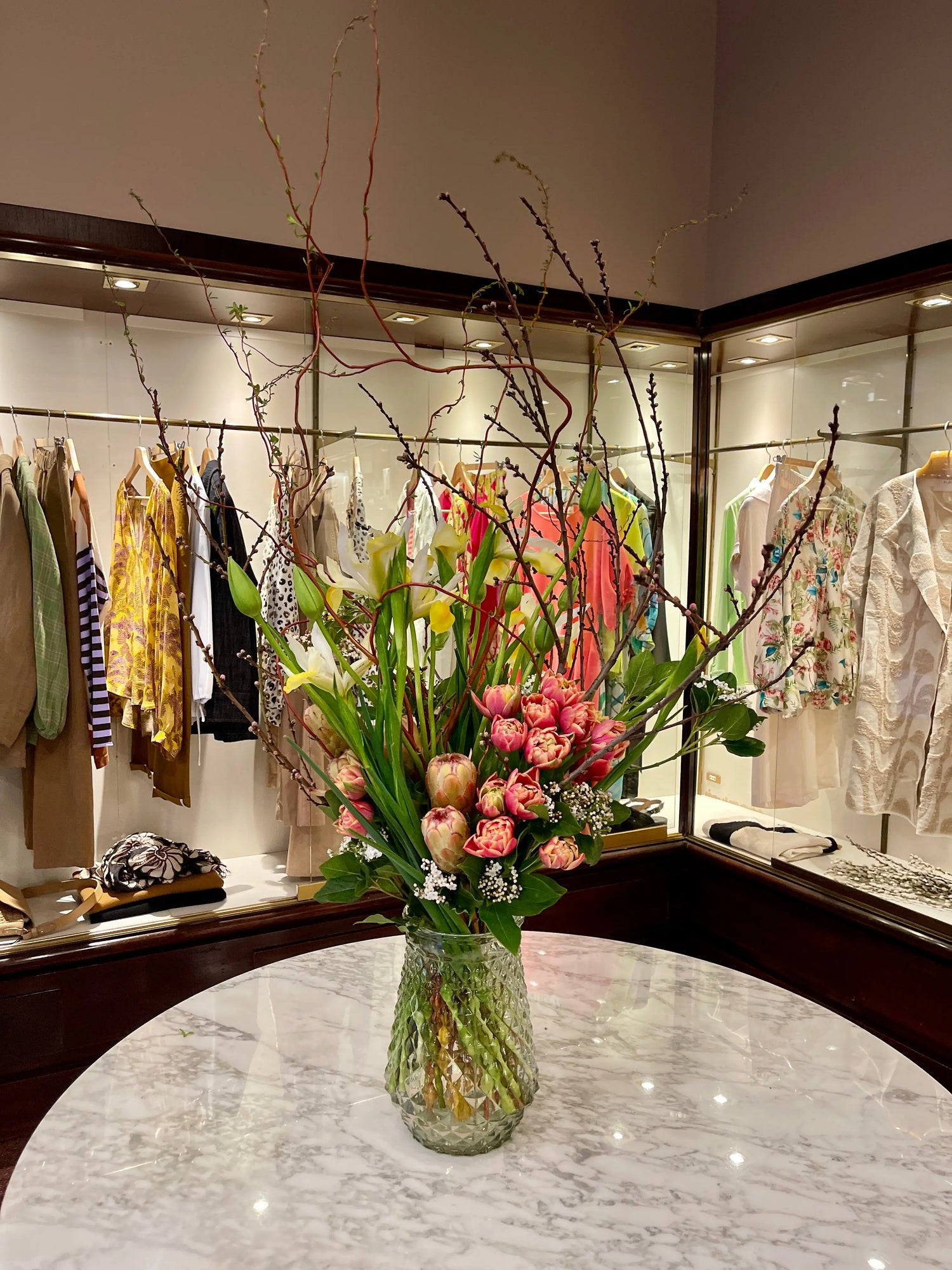 big bouquet of pink flowers and magnolia branches