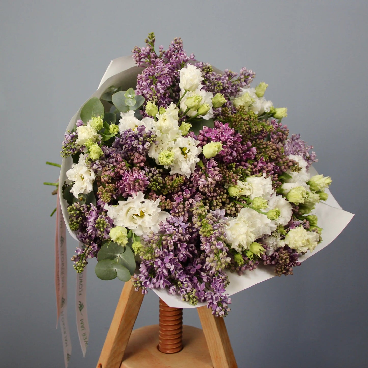bouquet of syringa blooms and lisianthus