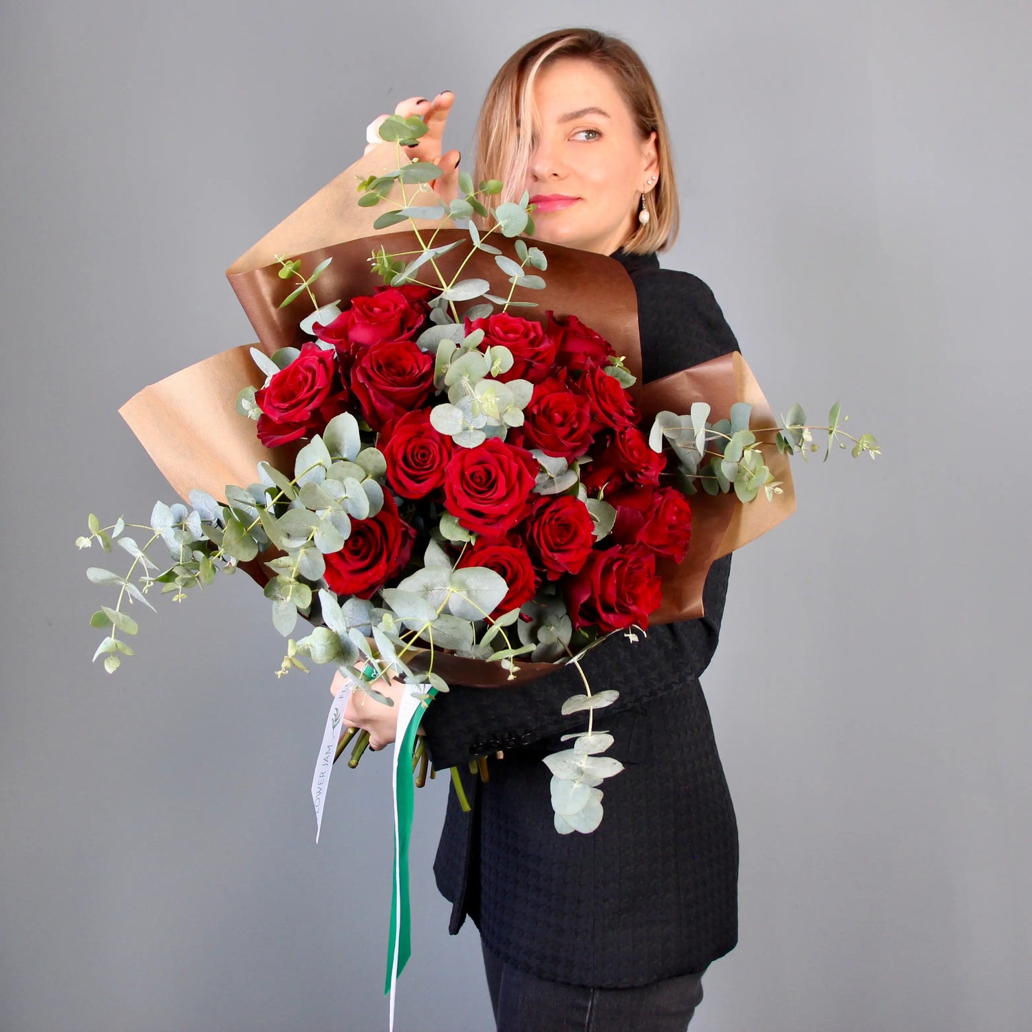 bouquet of red roses and eucalipt