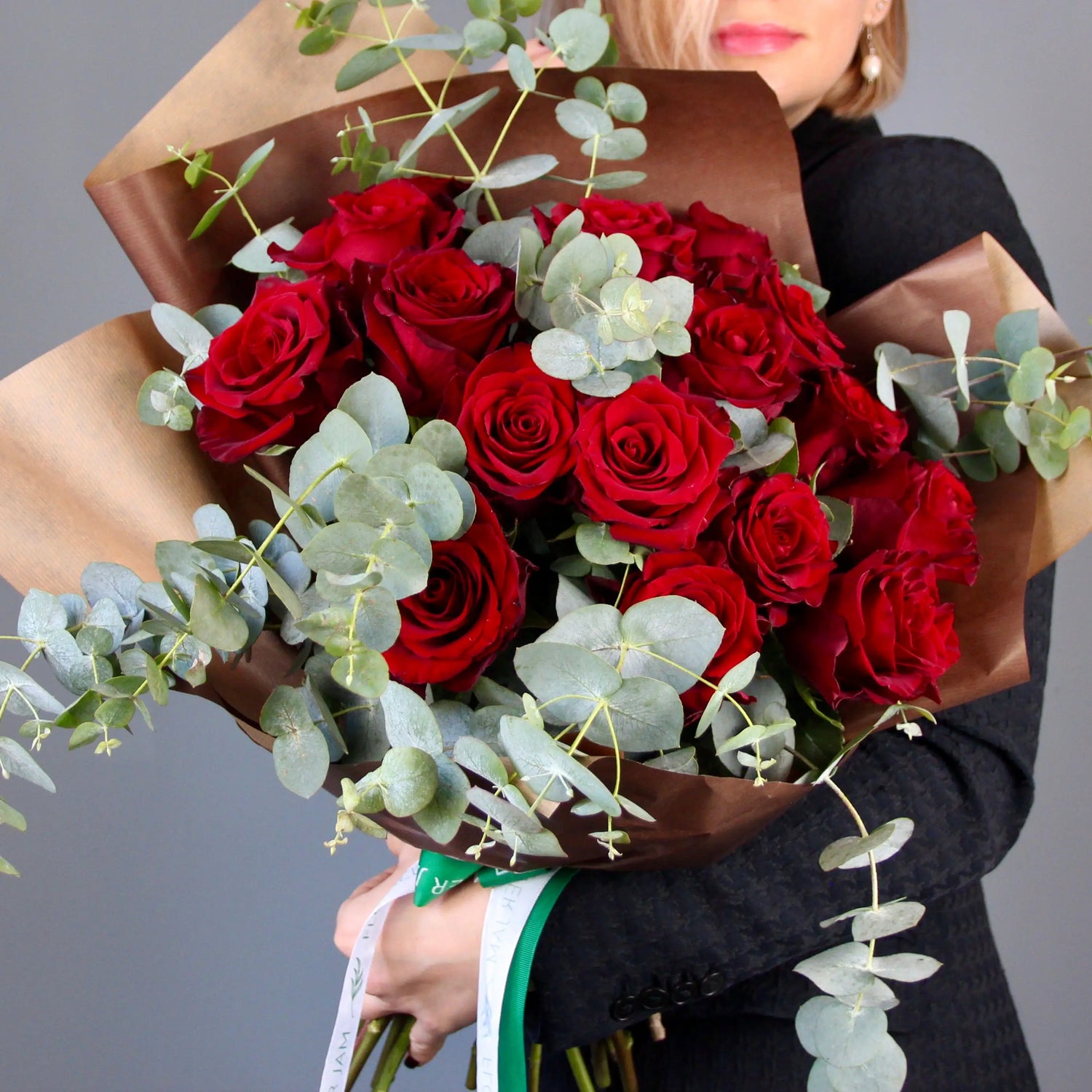 bouquet of red roses and eucalipt