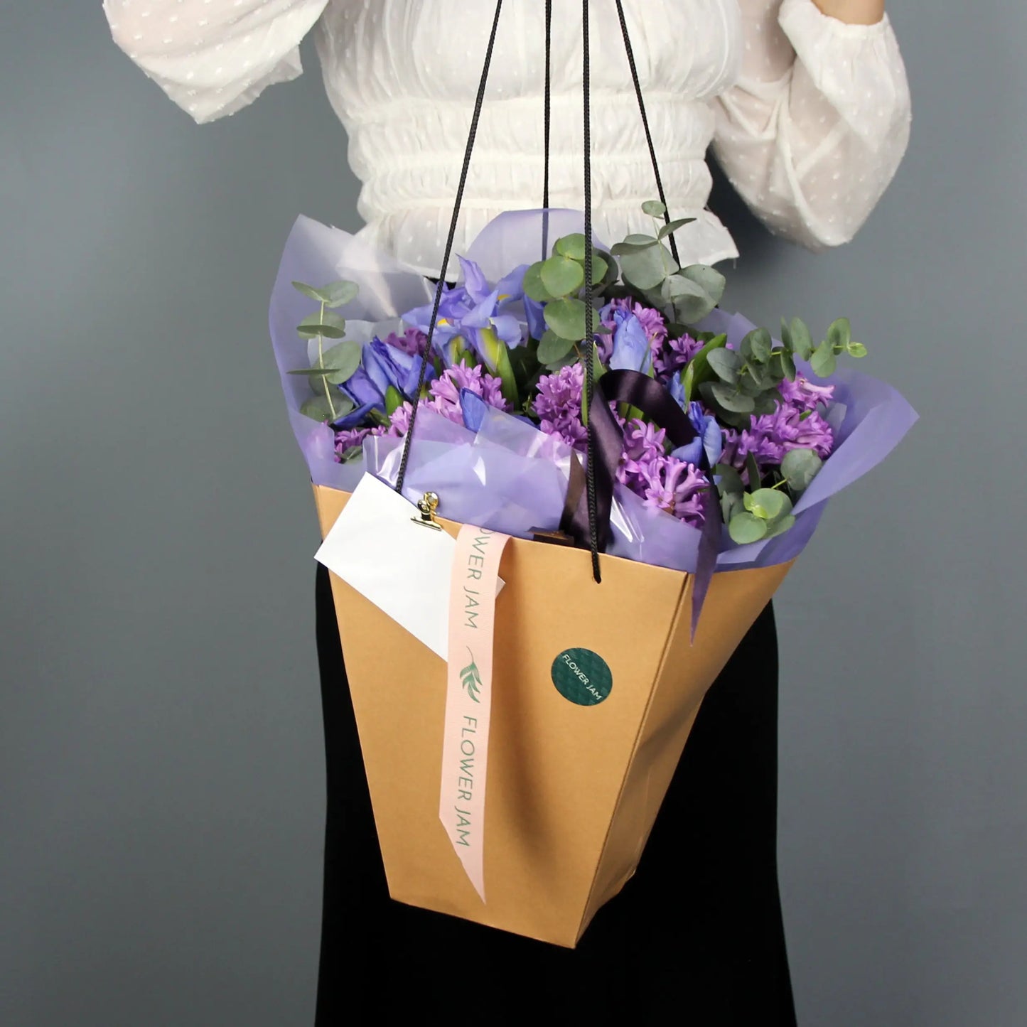 iris, hyacinth and eucalipt in a box