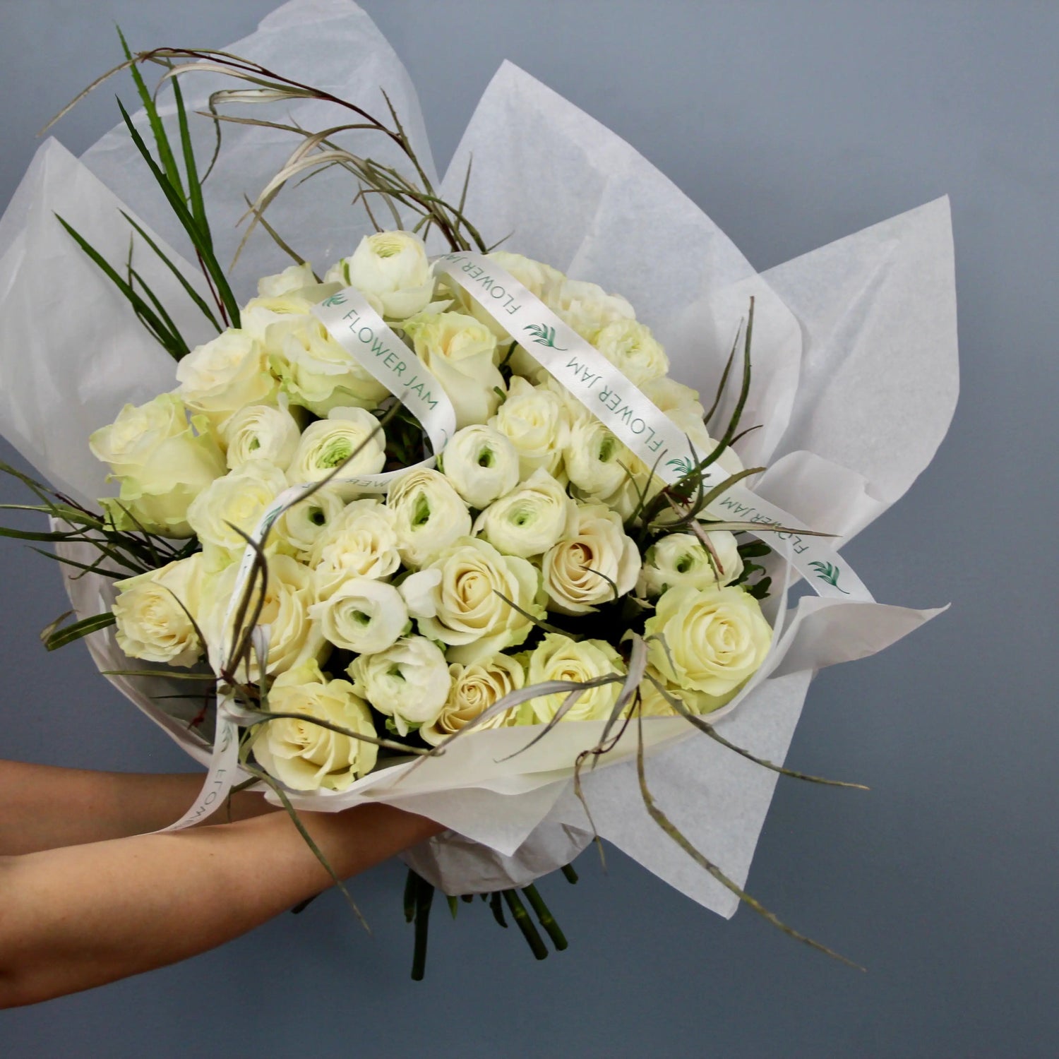 bridal bouquet of whie roses