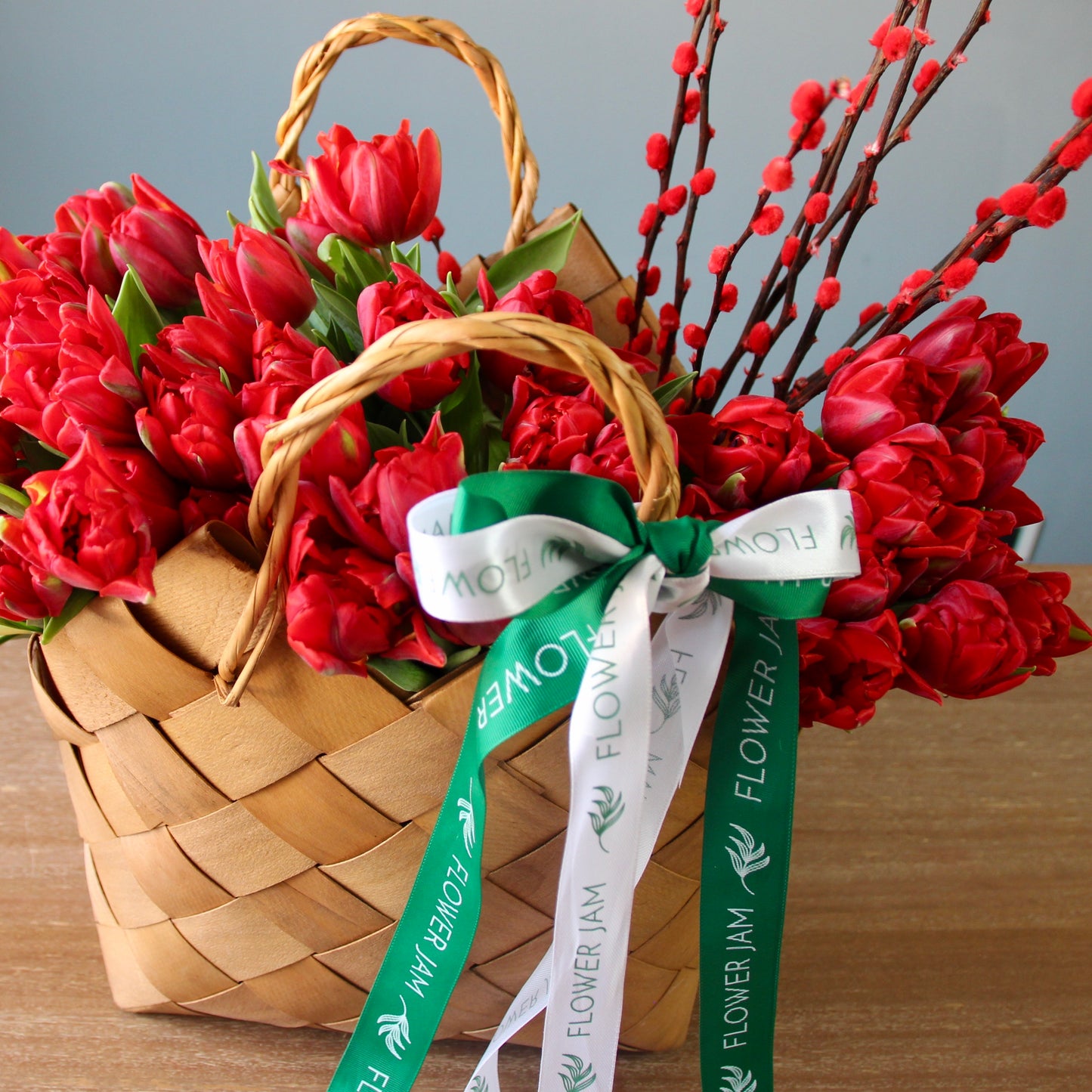 red tulips flowers delivery in Genoa Liguria French Riviera Flowers in a basket